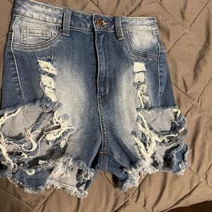 Distressed denim shorts